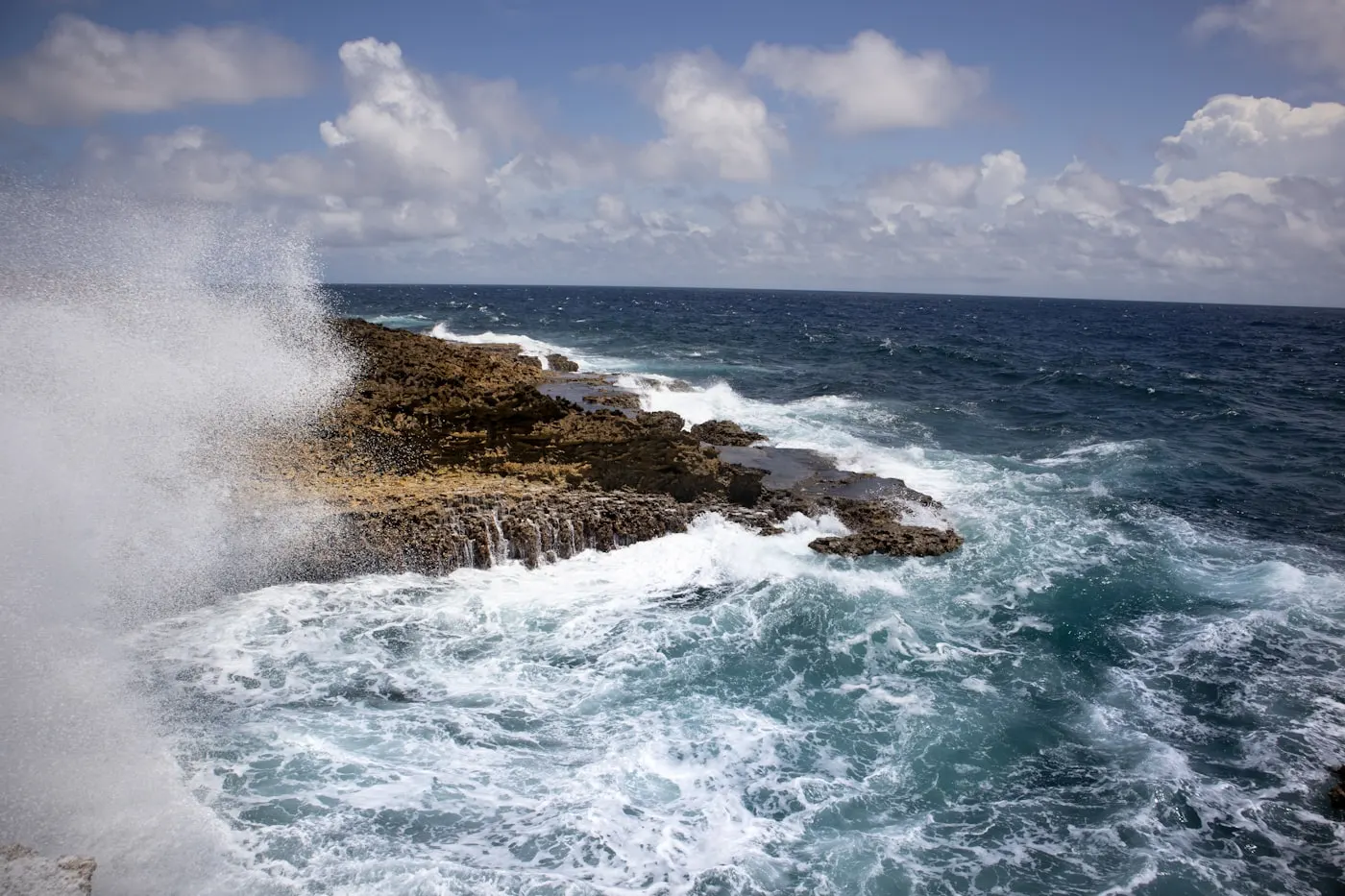 Waves crashing against the rocky north coast of Curaçao
