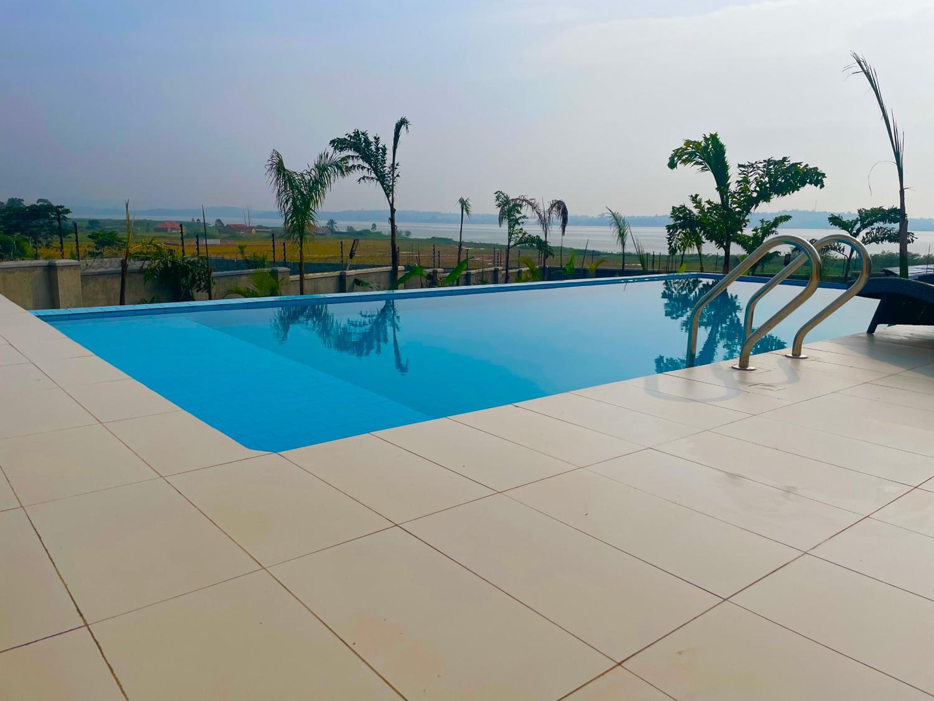 Infinity Pool Villas , Entebbe airport shuttle free parking private pool wifi 24 hr security